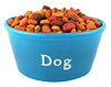 A blue bowl filled with dog food.